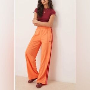 adidas Originals Adicolor Firebird oversized track pant in orange
